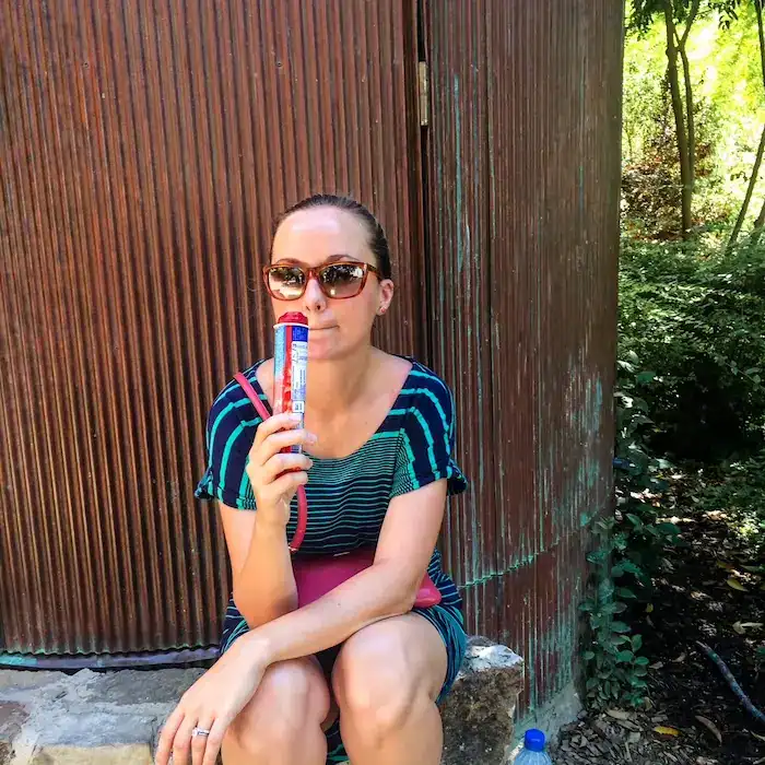 A woman eats a popsicle in Barcelona