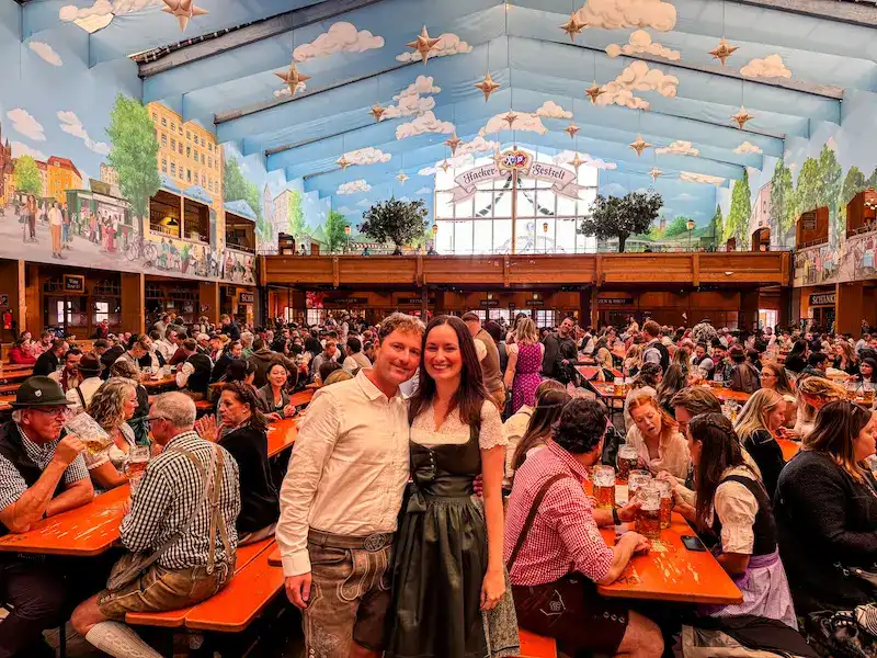A couple poses at Oktoberfest in Munich.