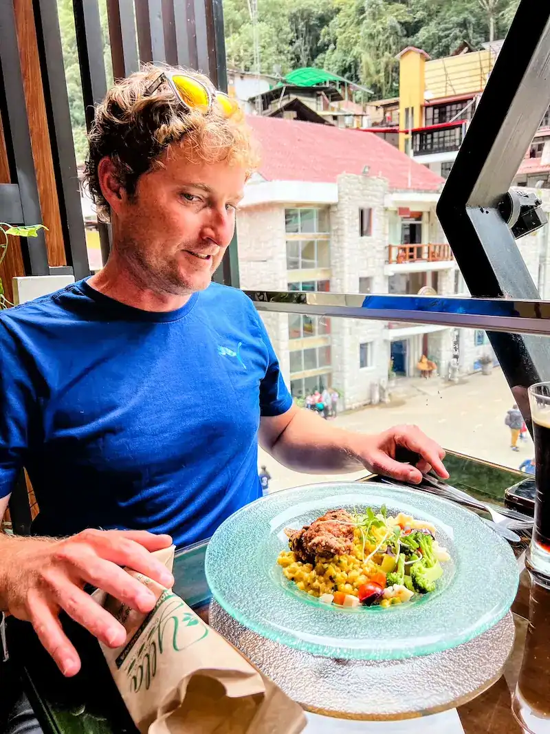 A man eats guinea pig on a Peru itinerary.